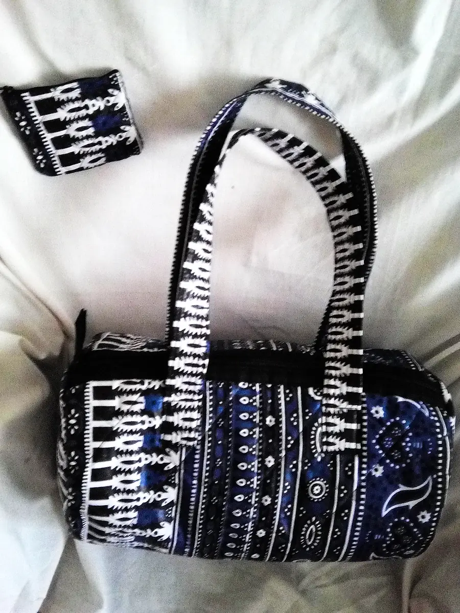 Zip-top barrel handbag in an indigo and white print with a matching coin purse