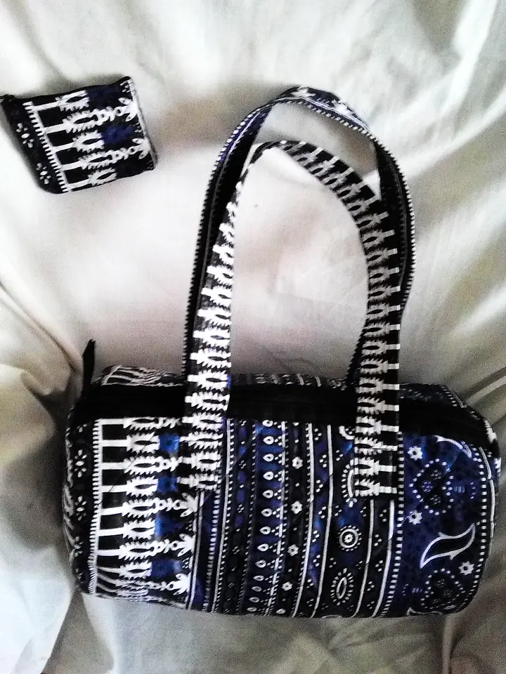 Zip-top barrel handbag in an indigo and white print with a matching coin purse
